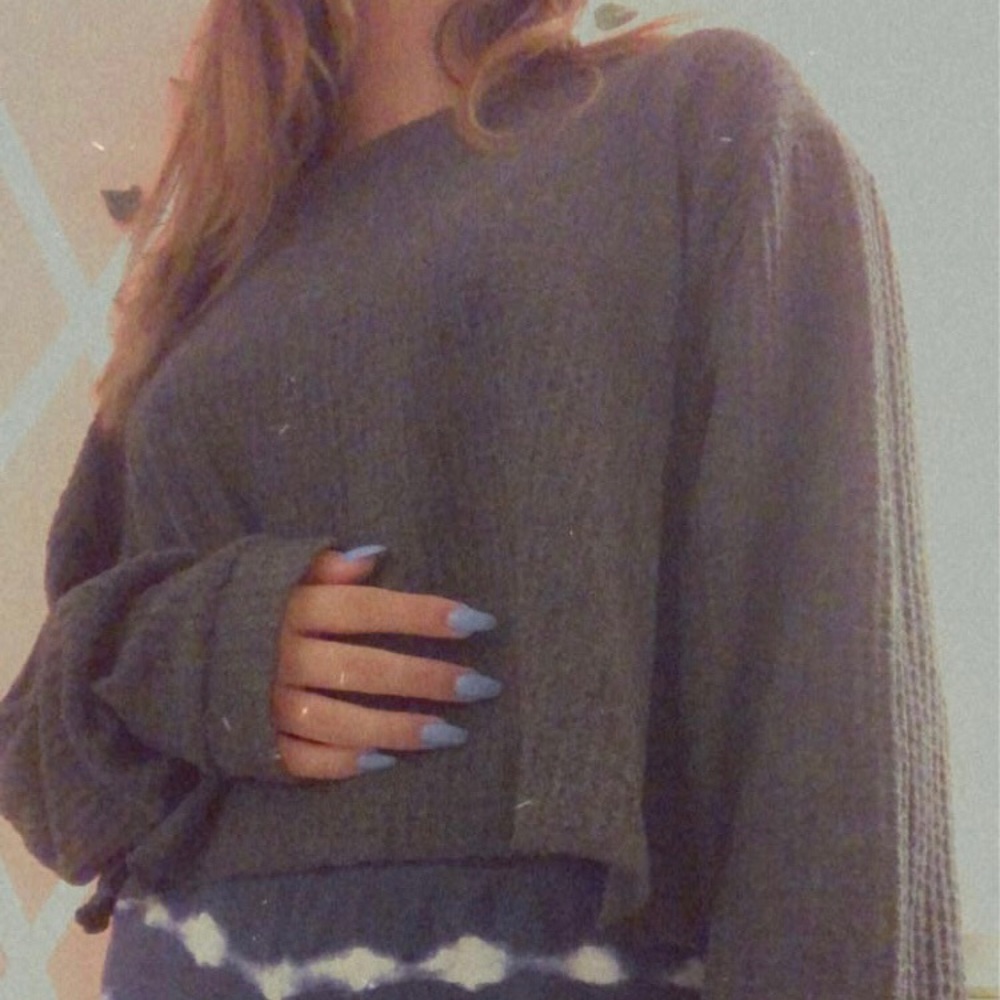 Charcoal grey cropped sweater.